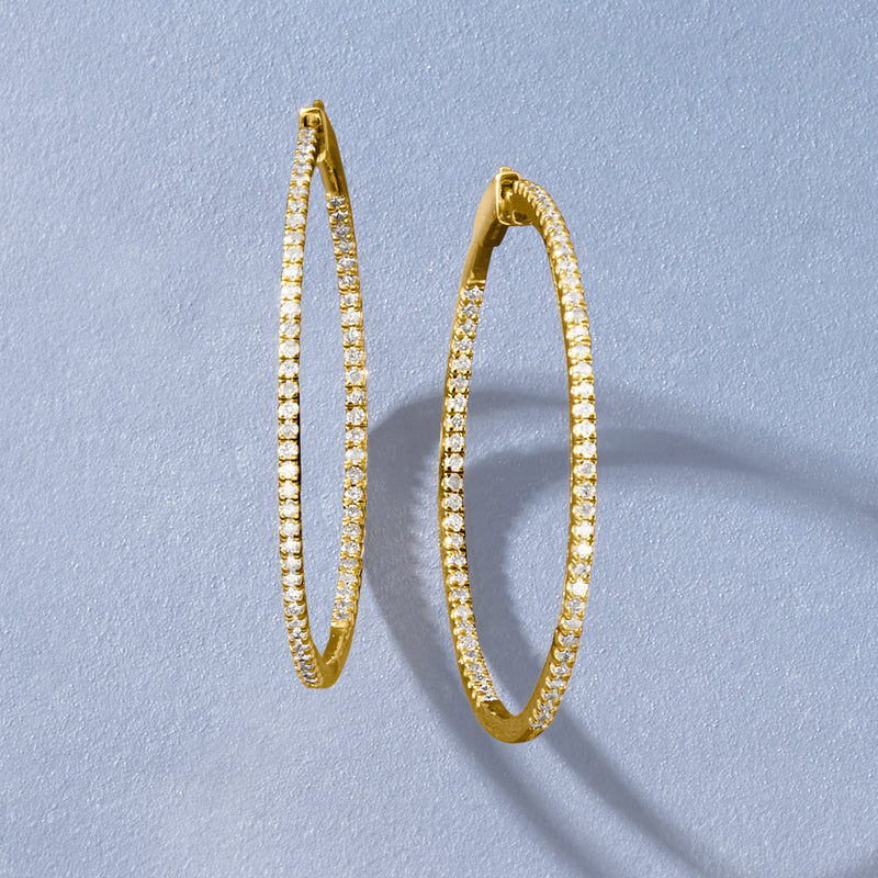 Diamond inside-outside hoop earrings in gold over sterling