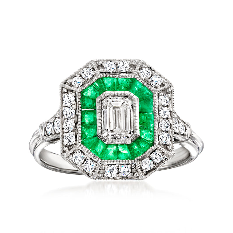 Vintage white gold ring with emerald center stone and diamond halo, size 7