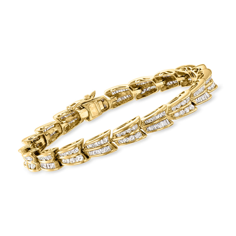 Vintage diamond link bracelet in 14kt yellow gold with baguette and round stones