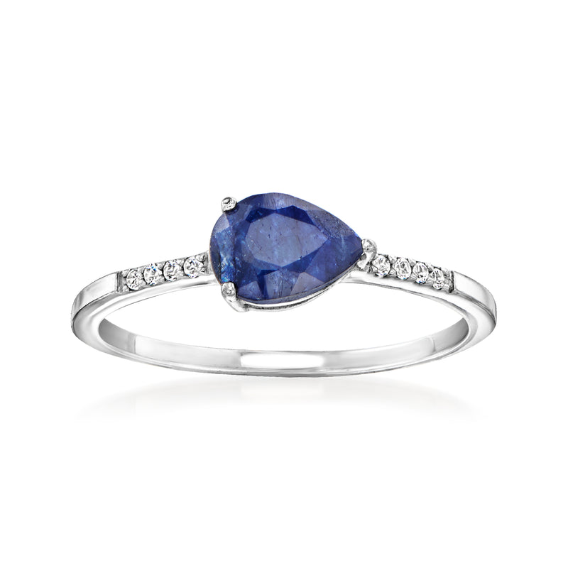 Sterling silver ring with oval blue sapphire center and white topaz accents
