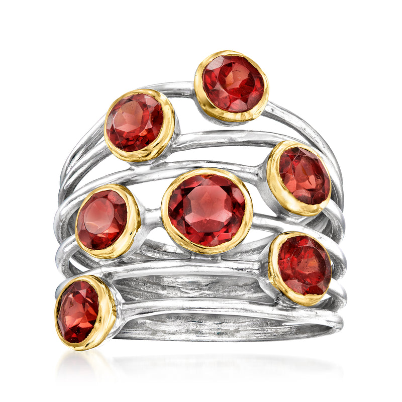 Sterling silver highway ring with six round red garnet stones in gold bezels