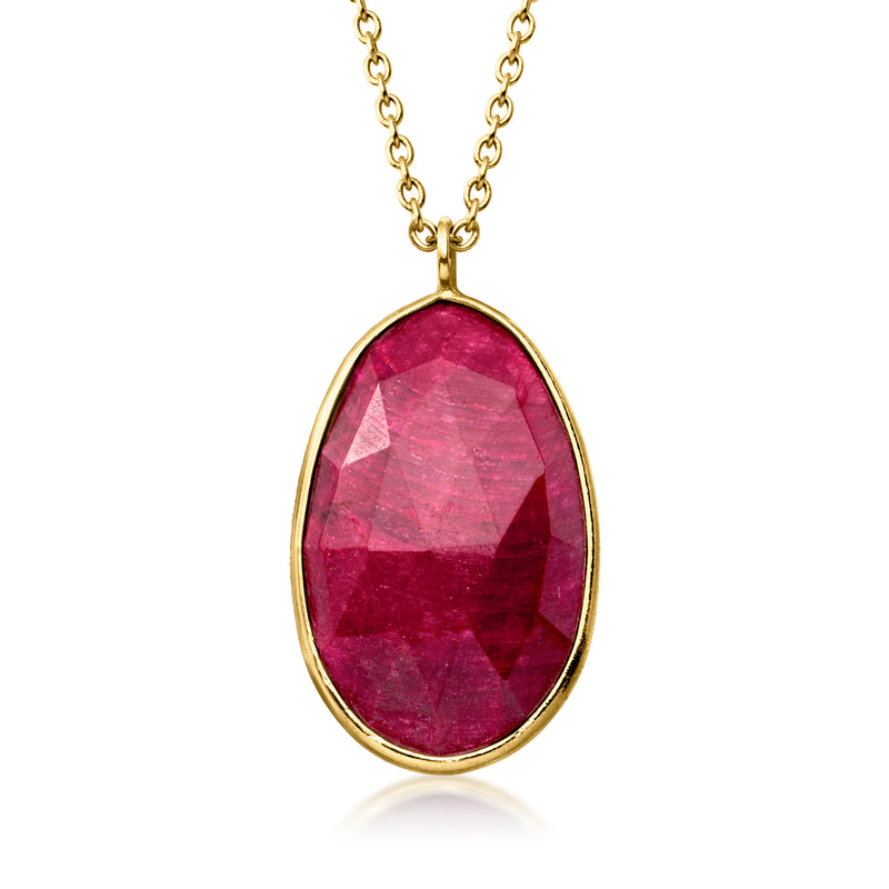 Oval ruby gemstone pendant necklace on gold-tone chain