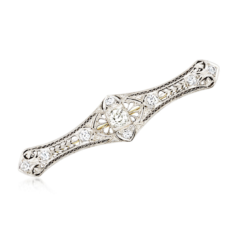 Diamond filigree bar pin in platinum and 14kt white gold with oval center stones