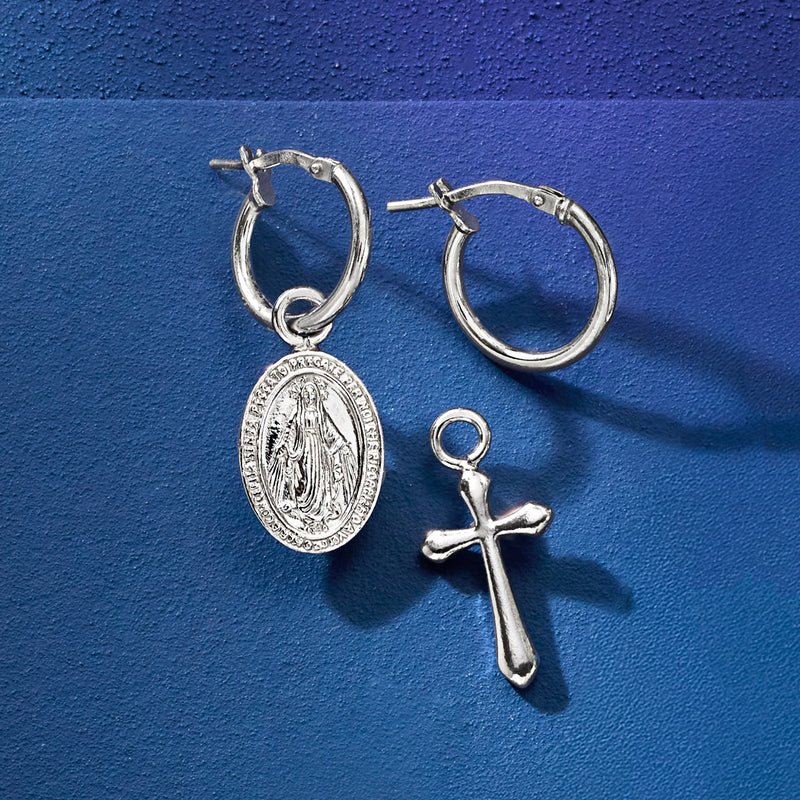 Sterling silver hoop earrings with oval medallion and a separate cross drop charm