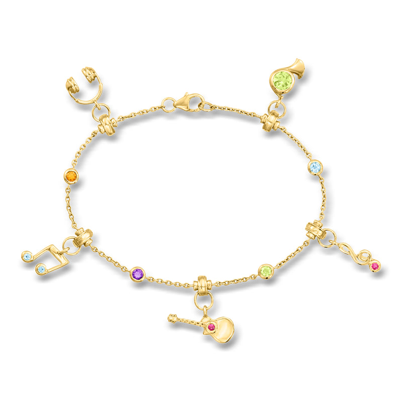 Gold-tone charm bracelet with colorful gemstone musical notes and heart dangles