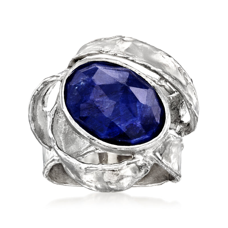 Sterling silver ring with large oval blue sapphire stone bezel-set