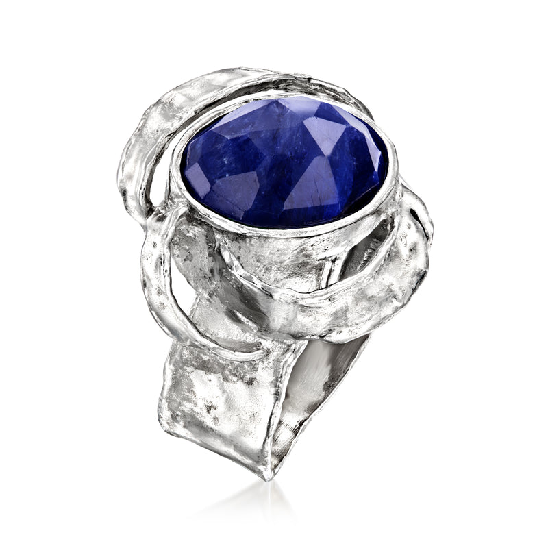 Sterling silver ring with oval deep-blue sapphire and sculpted gallery setting