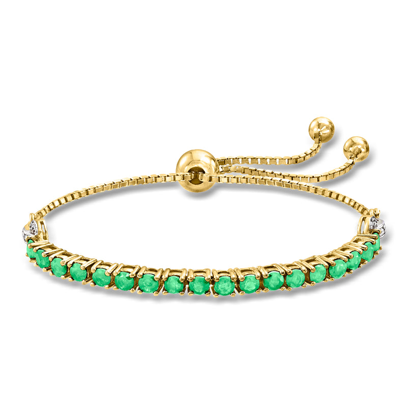 Gold bolo bracelet with emerald-green gemstone row and round gold clasp ends