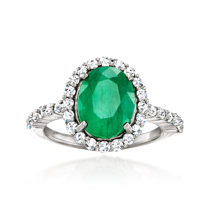 Green oval gemstone halo ring in 14kt white gold with diamond accents
