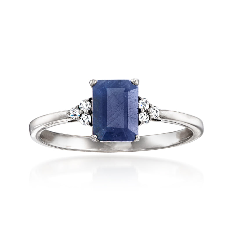14kt white gold ring with rectangular dark blue sapphire and small round diamond accents