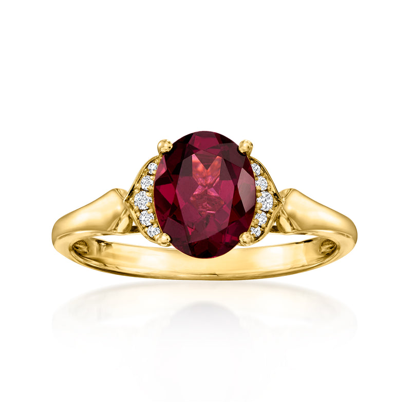 14kt yellow gold rhodolite garnet ring with oval gem and diamond side accents
