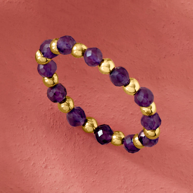 Purple amethyst bead stretch ring with gold round bead spacers, close-up