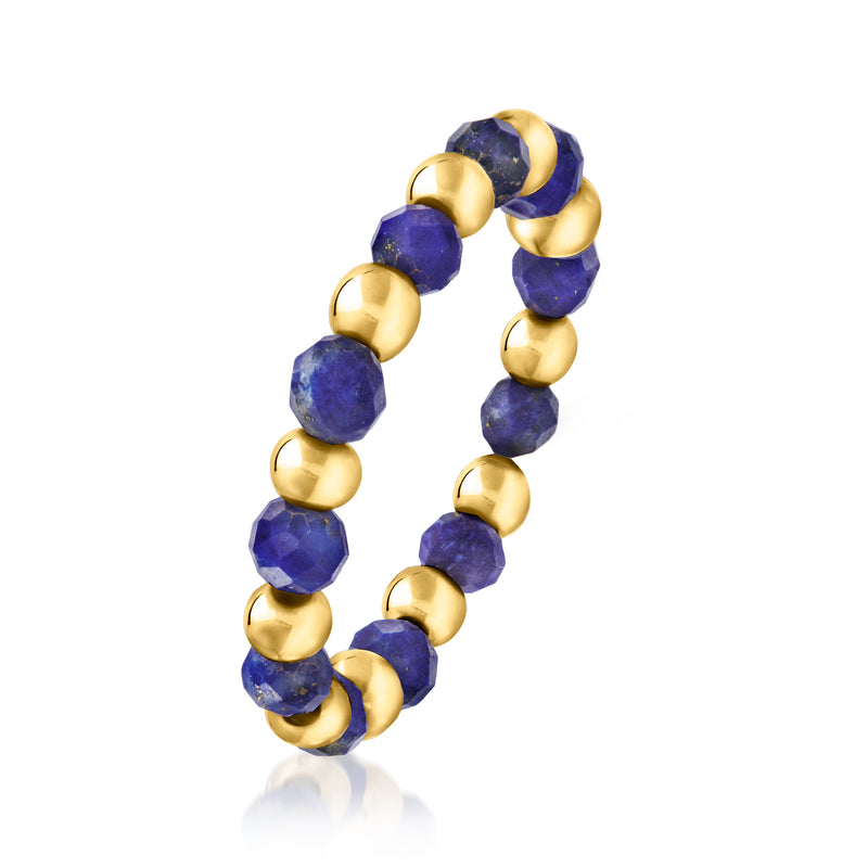 Blue lapis bead stretch ring with round 14kt yellow gold bead accents, close-up