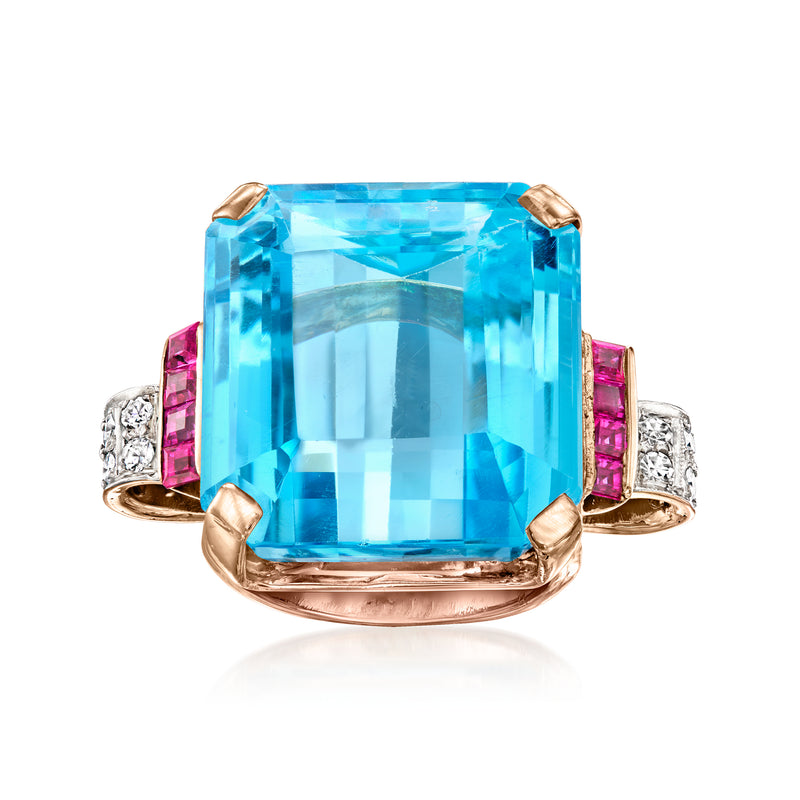 Vintage rose gold ring with large rectangular Swiss blue topaz and pink ruby side stones