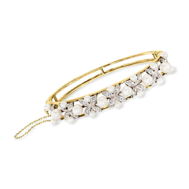 Two-tone gold bangle bracelet with cultured pearls and diamond accents