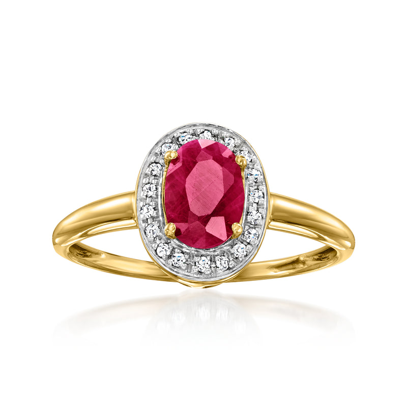 Yellow gold ring with oval ruby center and diamond halo, split prong band