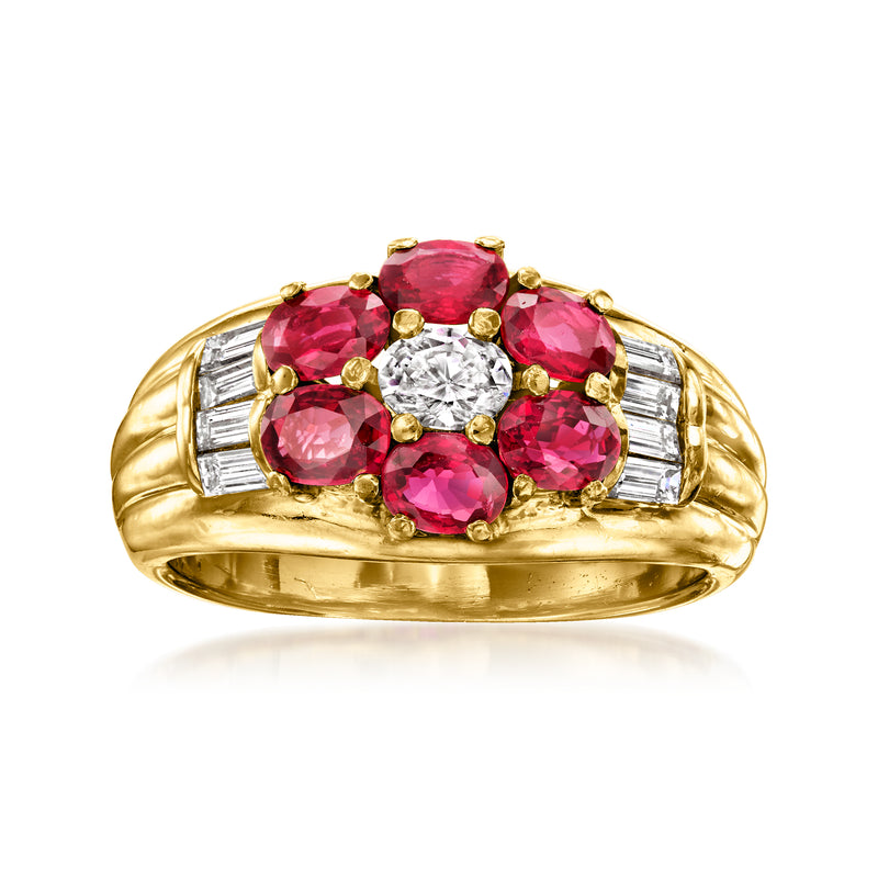 18kt yellow gold flower ring with pink rubies and round diamond center