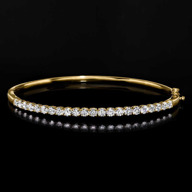 Gold over sterling diamond bangle bracelet with round stones