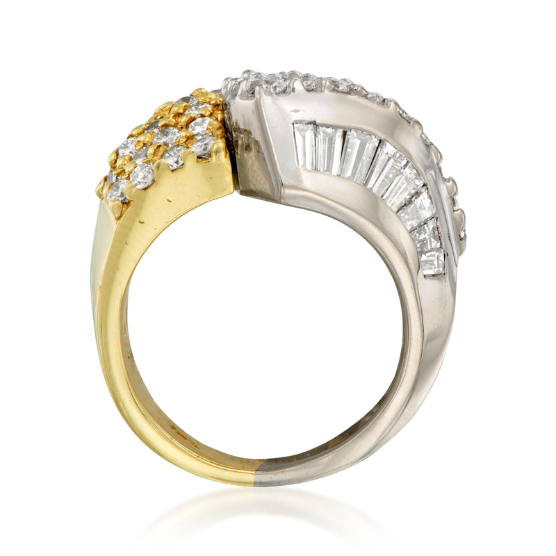 Two-tone gold bypass diamond ring with bright white diamond band and yellow underband.