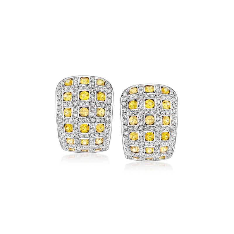 Curved stud earrings with yellow sapphire squares and diamond accents in white gold
