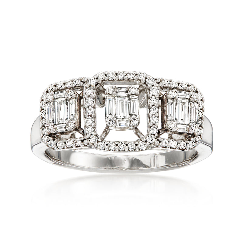 18kt white gold diamond ring with central emerald-cut stone and side square halos