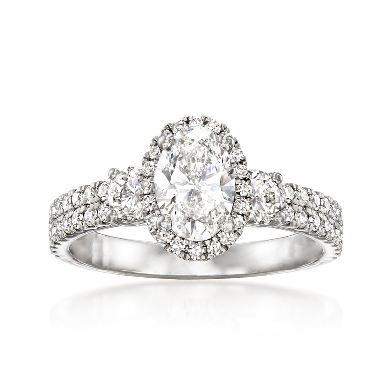 Lab-grown diamond ring in 14k white gold with oval center and round stone halo