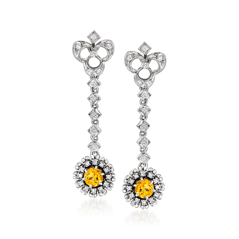White gold drop earrings with oval citrine and diamond halo, dangling diamond line