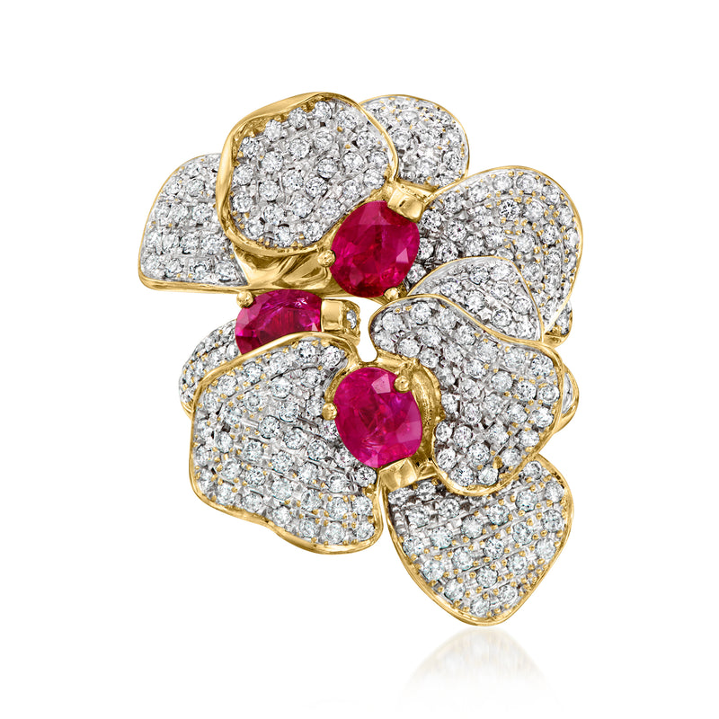 Yellow gold diamond and ruby flower ring with three oval ruby accents