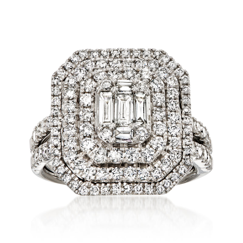 White gold diamond cluster ring with emerald-cut center and halo of round diamonds