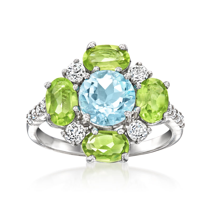 Sterling silver ring with sky blue oval topaz center, green peridot and white topaz accents