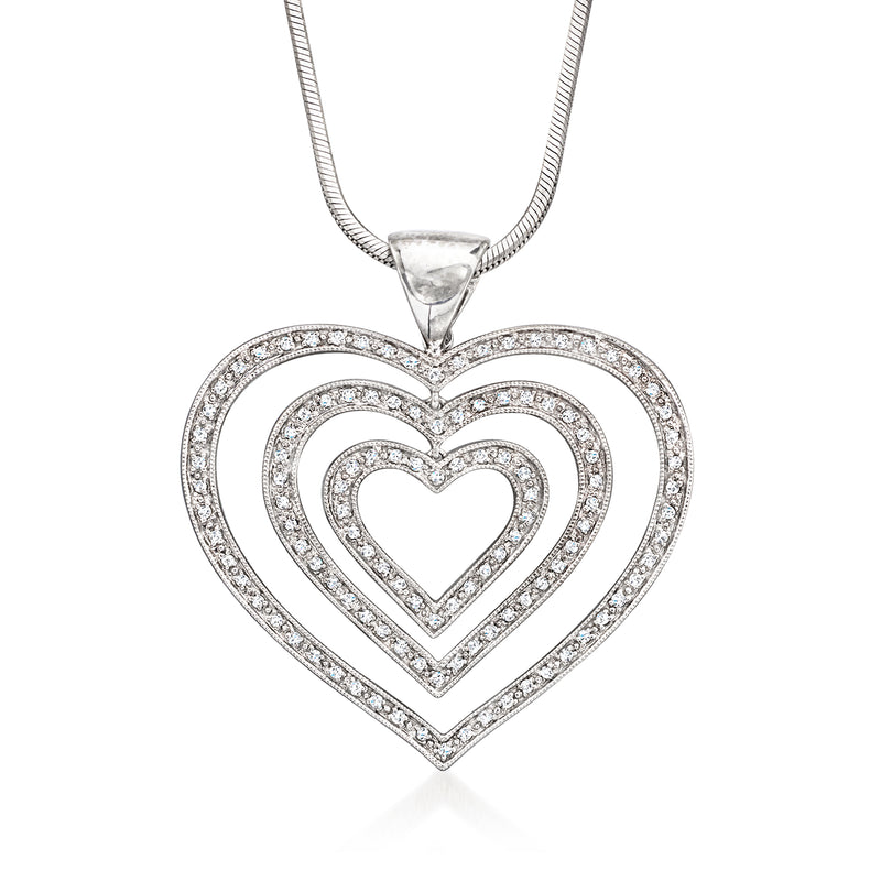 Heart pendant necklace in white gold with layered diamond heart outlines