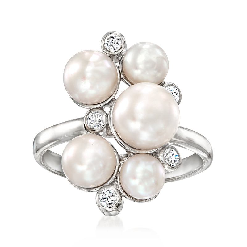 Sterling silver ring with five white cultured pearls and round white topaz accents