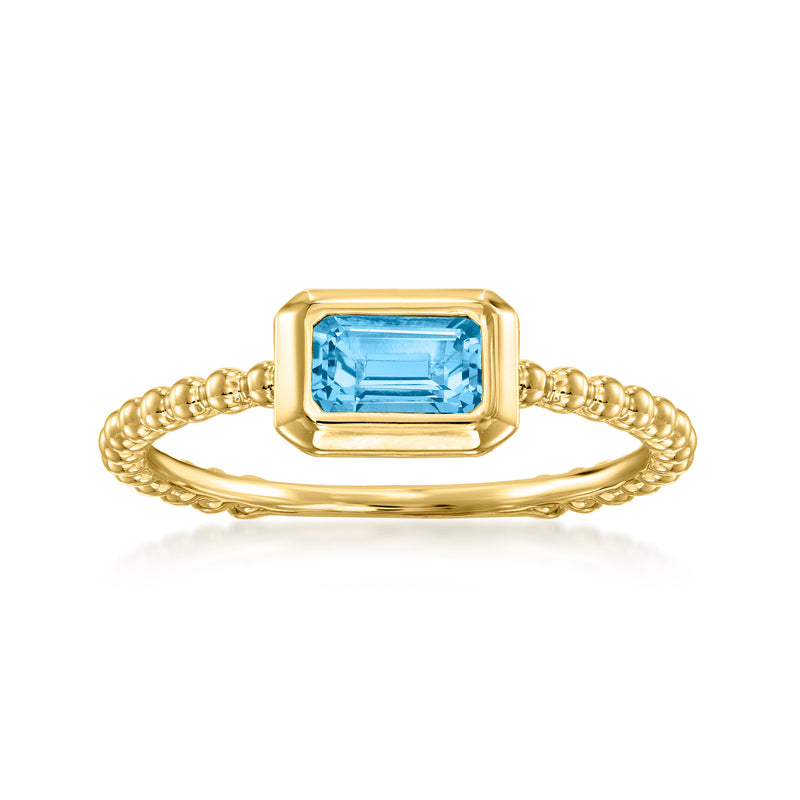 14kt yellow gold ring with bezel-set rectangular blue topaz and braided band