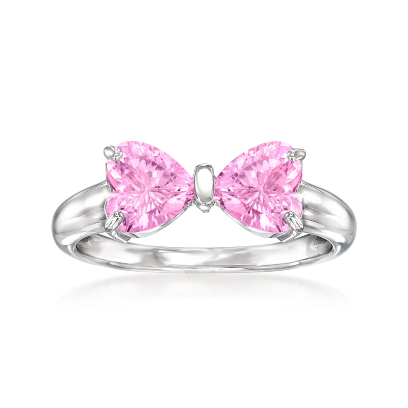 Sterling silver bowtie ring with pink simulated sapphire center stone and side accents