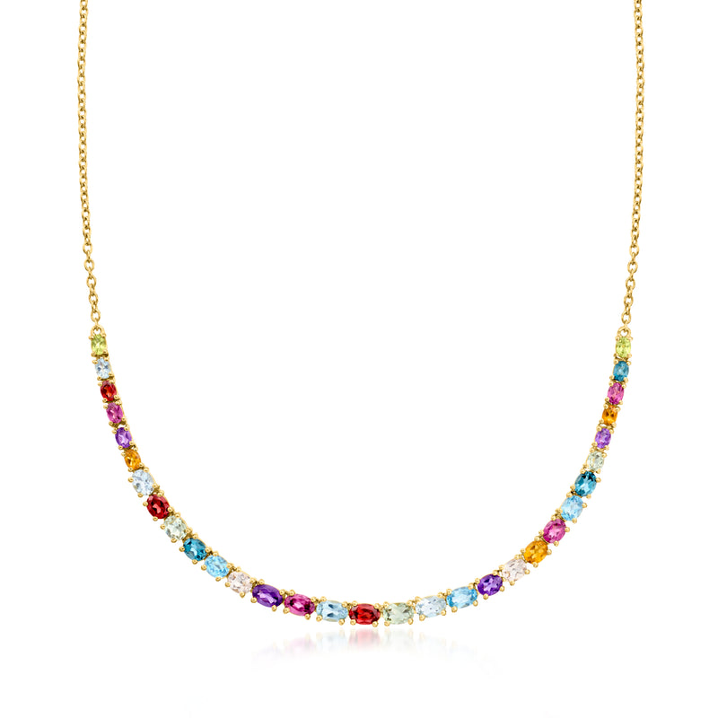 Multi-gemstone necklace with gold chain and colorful round stones, close-set.