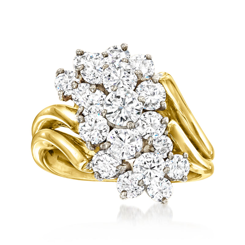 Two-tone gold diamond waterfall ring with large round center stone and clustered rounds