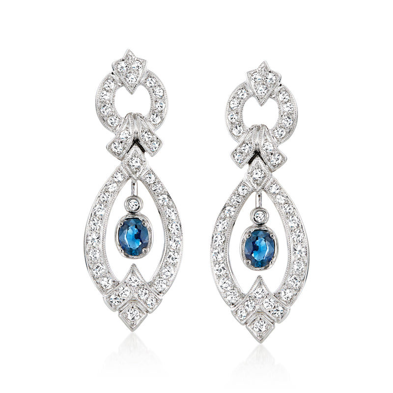 18kt white gold diamond and sapphire drop earrings with blue teardrop centers, post style