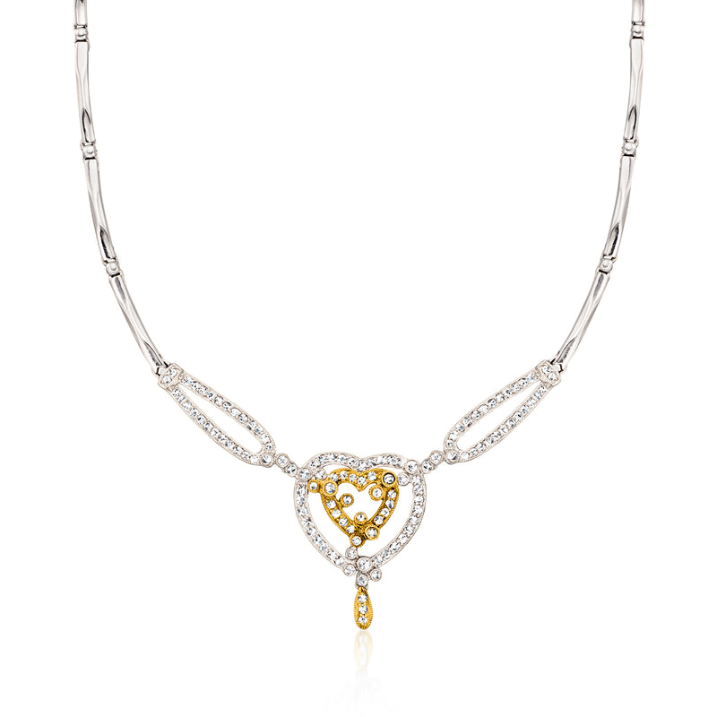 Diamond heart necklace in two-tone gold with pavé heart pendant and drop