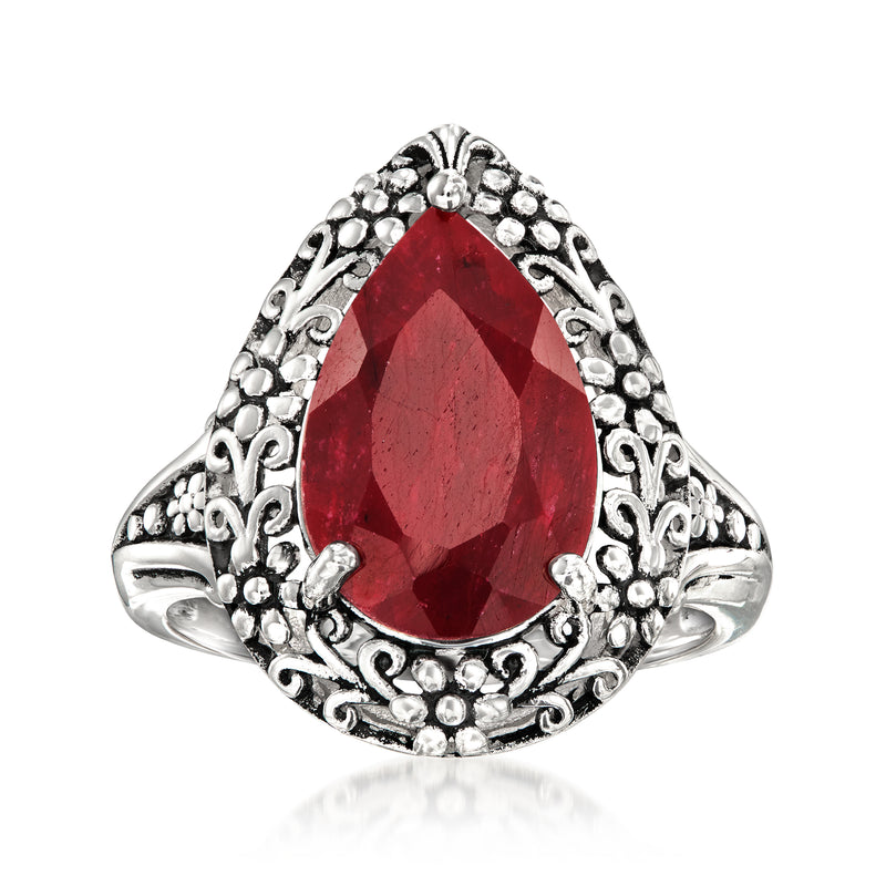 Sterling silver ruby teardrop ring with halo of small round stones and ornate filigree setting