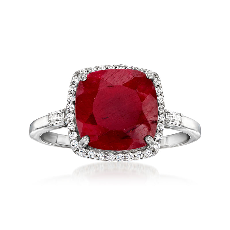 Sterling silver ring with large red oval ruby-style center and white gemstone halo