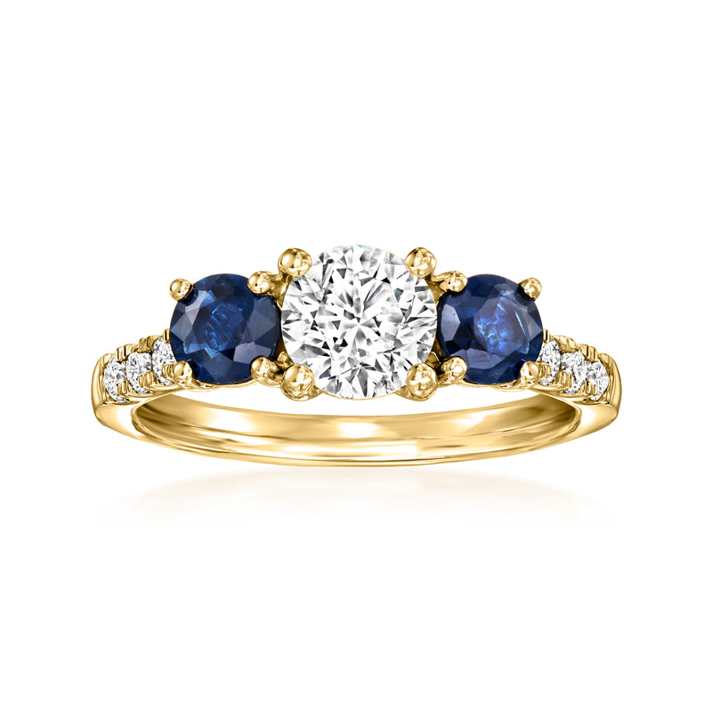14k yellow gold ring with round lab-grown diamond and two blue sapphire stones