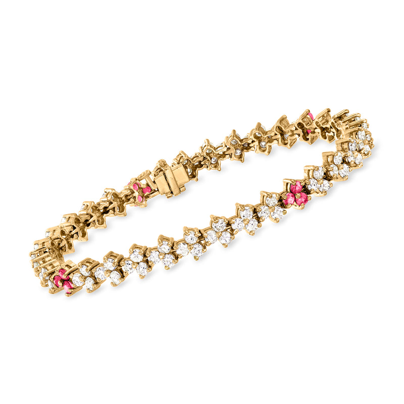 14kt yellow gold tennis bracelet with diamond stones and pink ruby accents