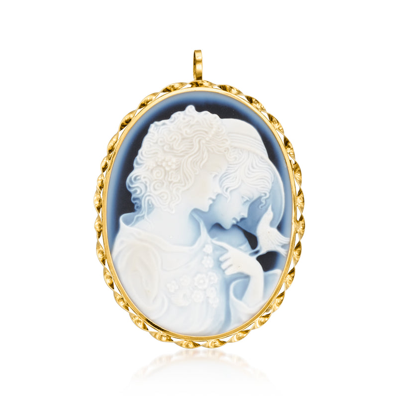 Oval cameo pendant with white relief figure in blue agate, set in 18kt yellow gold bezel.
