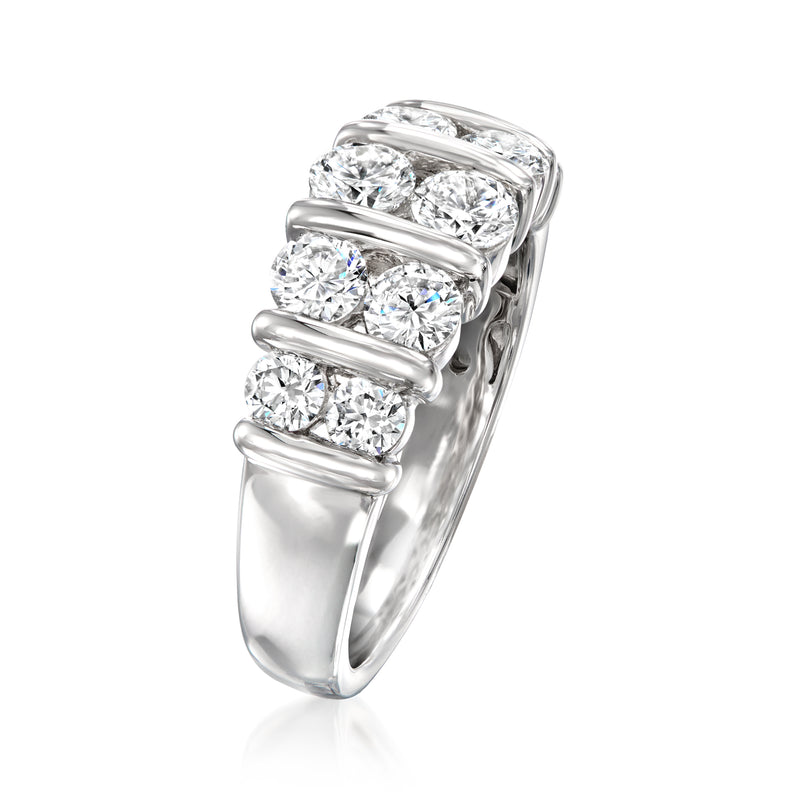 14kt white gold ring with three round lab-grown diamonds on raised, rounded bands