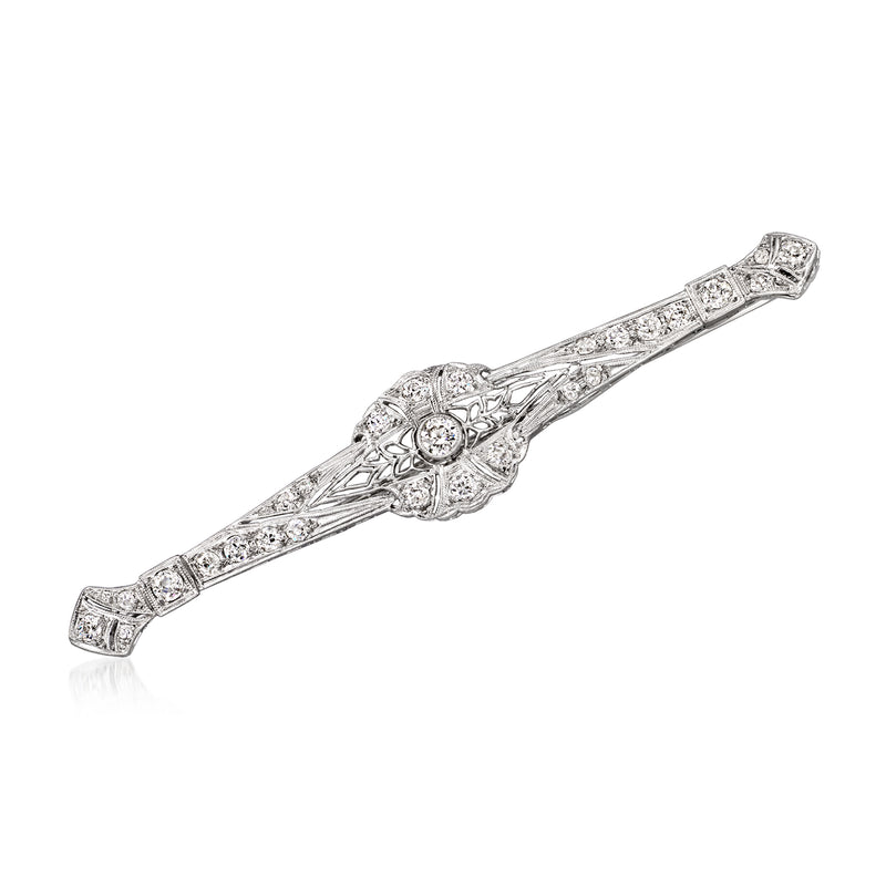 Platinum diamond filigree bar pin with long geometric frame and central oval motif