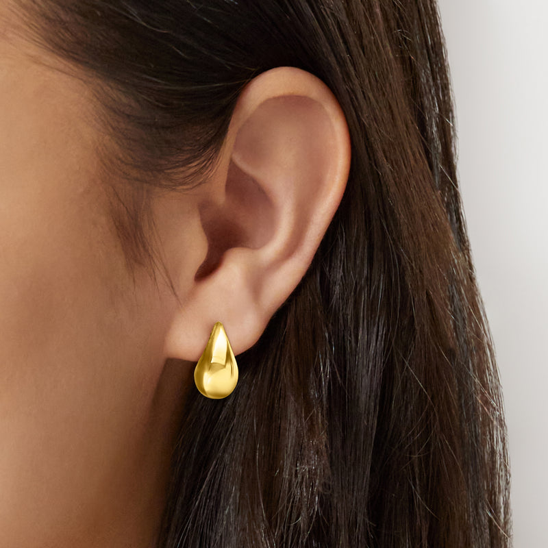 10kt yellow gold teardrop drop earrings on ear, small teardrop dangles