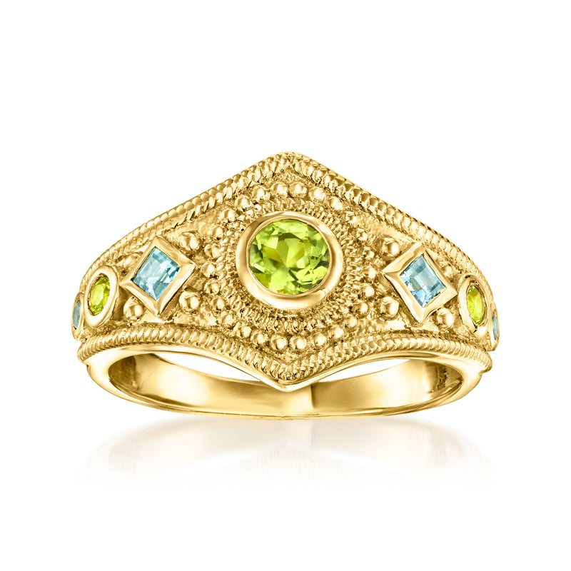 Gold milgrain ring with green oval center and blue square side stones