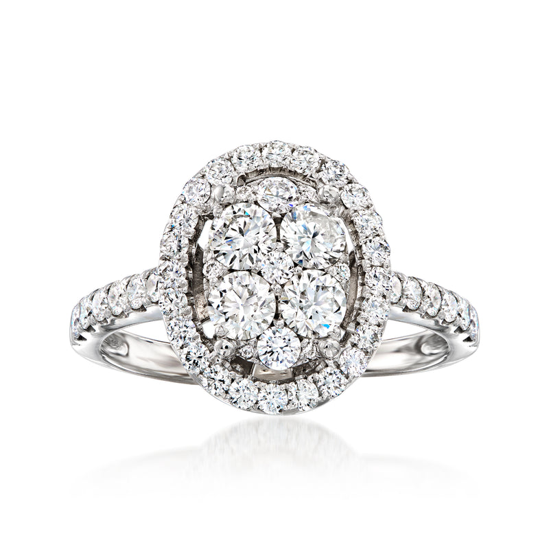 14kt white gold diamond cluster ring with oval halo and round center stone