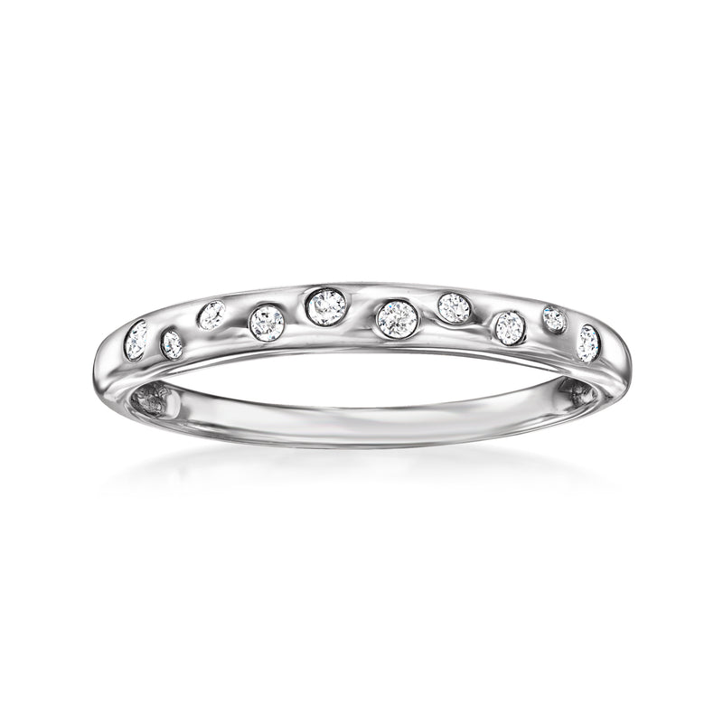Sterling silver dotted diamond ring with round stones along the top band