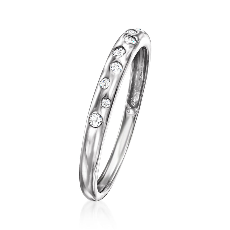 Sterling silver diamond dotted ring with small round stones on the curved top